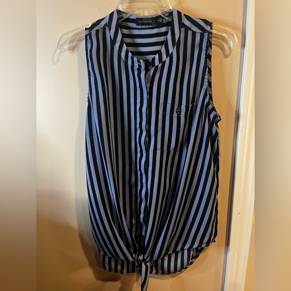 The Limited Size Medium super cute Dark and lighter blue in color sleeveless top